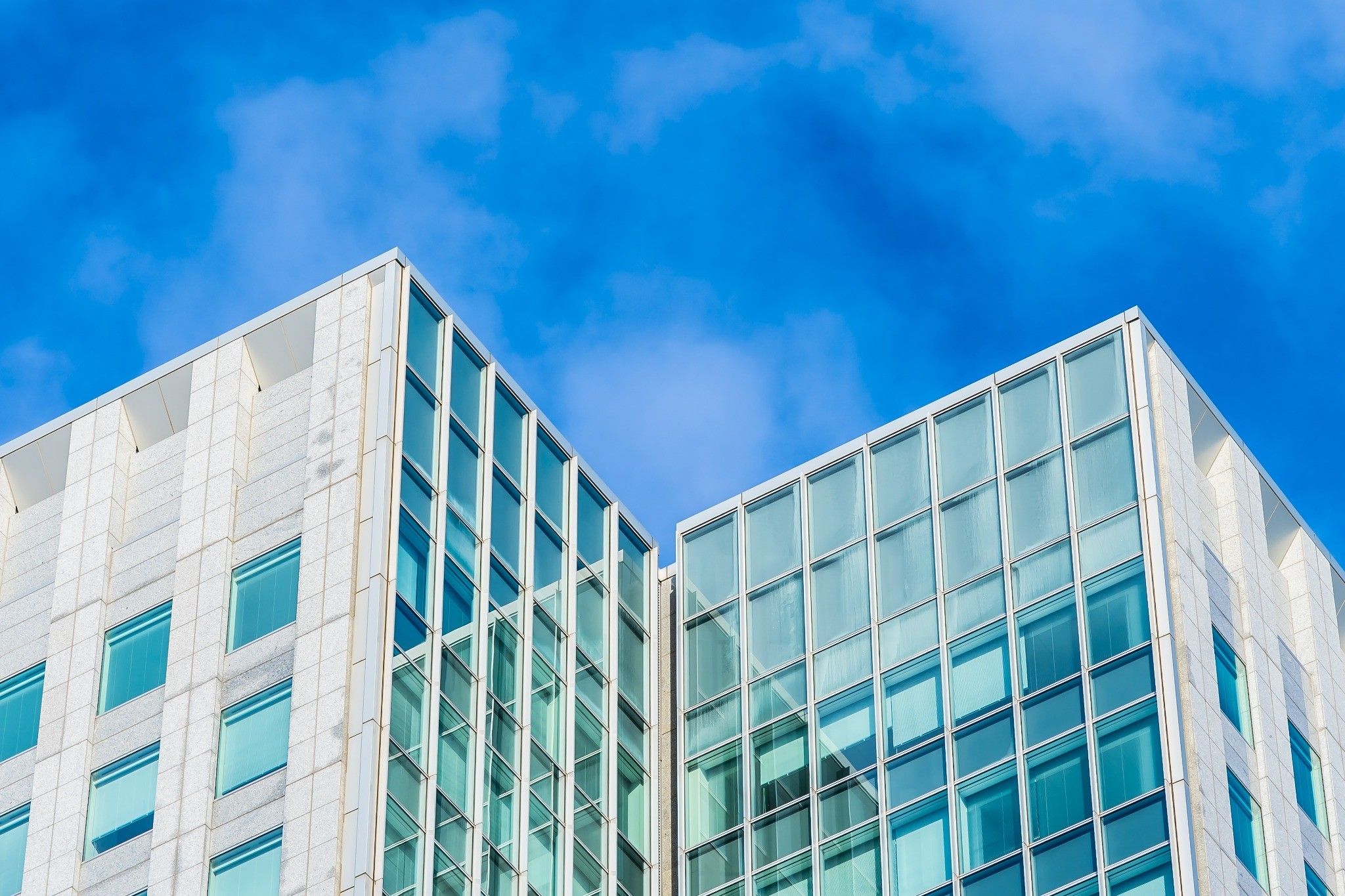 beautiful-architecture-office-business-building-with-glass-window-shape_under1MB.jpg