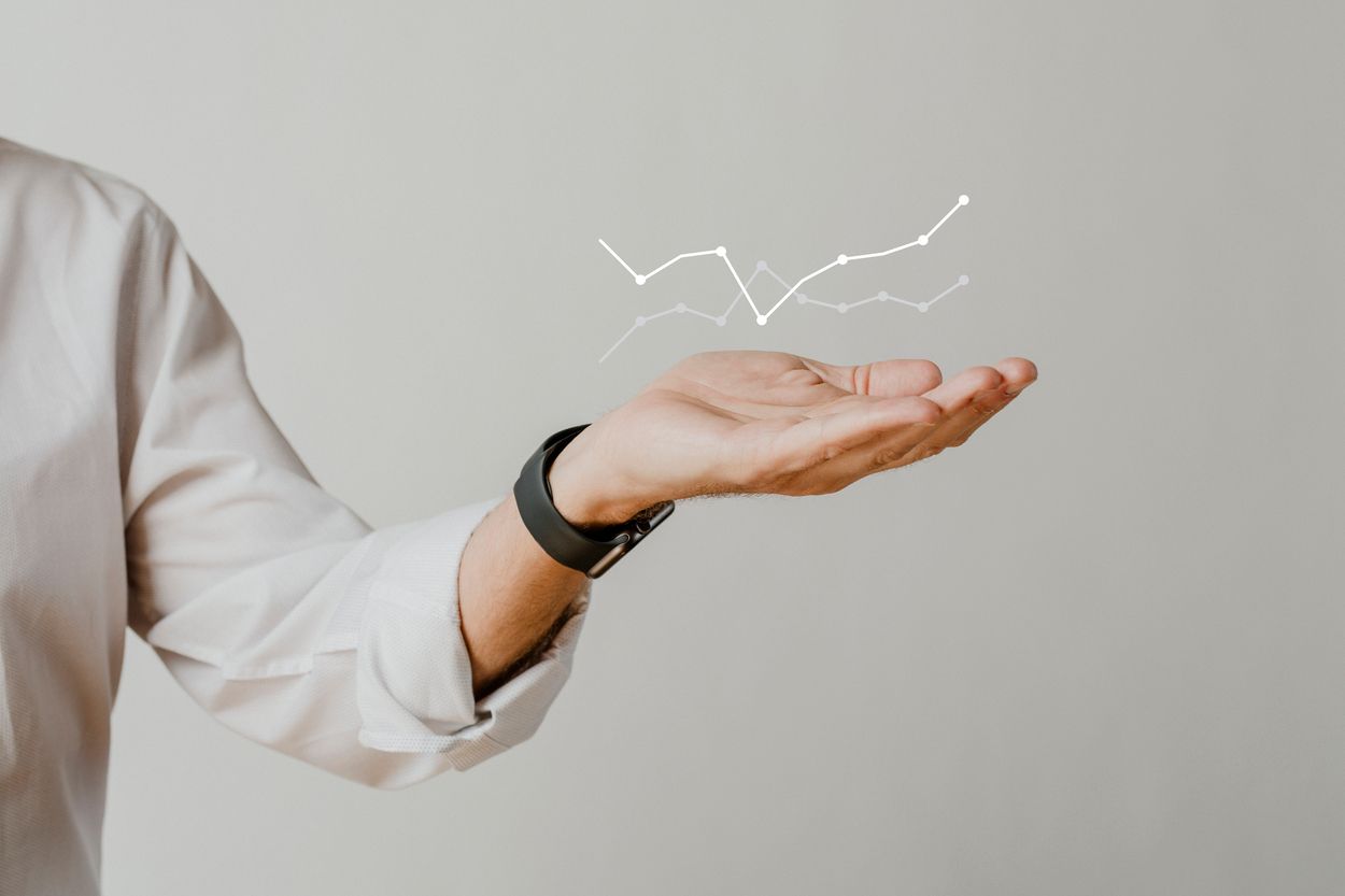 digital-graph-with-businessman-hand-overlay (1).jpg